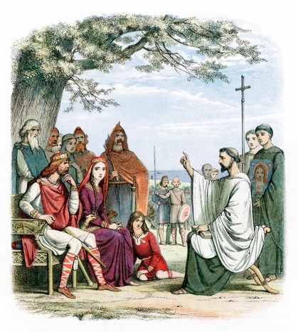 Sfantul Augustin de Canterbury (d604).  Augustin a fost trimis de Papa Grigore I pentru a-i converti pe anglo-saxoni la crestinism.  El este vazut aici predicand inaintea lui Ethelbert (552?-616), rege anglo-saxon al Kent-ului, pe care l-a botezat in 597. Augustin a fost primul arhiepiscop de Canterbury.  (Fotografie de Ann Ronan Pictures/Print Collector/Getty Images)